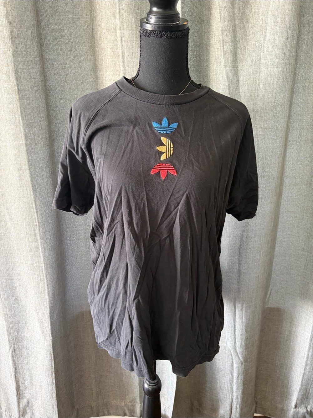 adidas Black Short Sleeve Tee with Blue, Yellow & Red Trefoils Center Chest